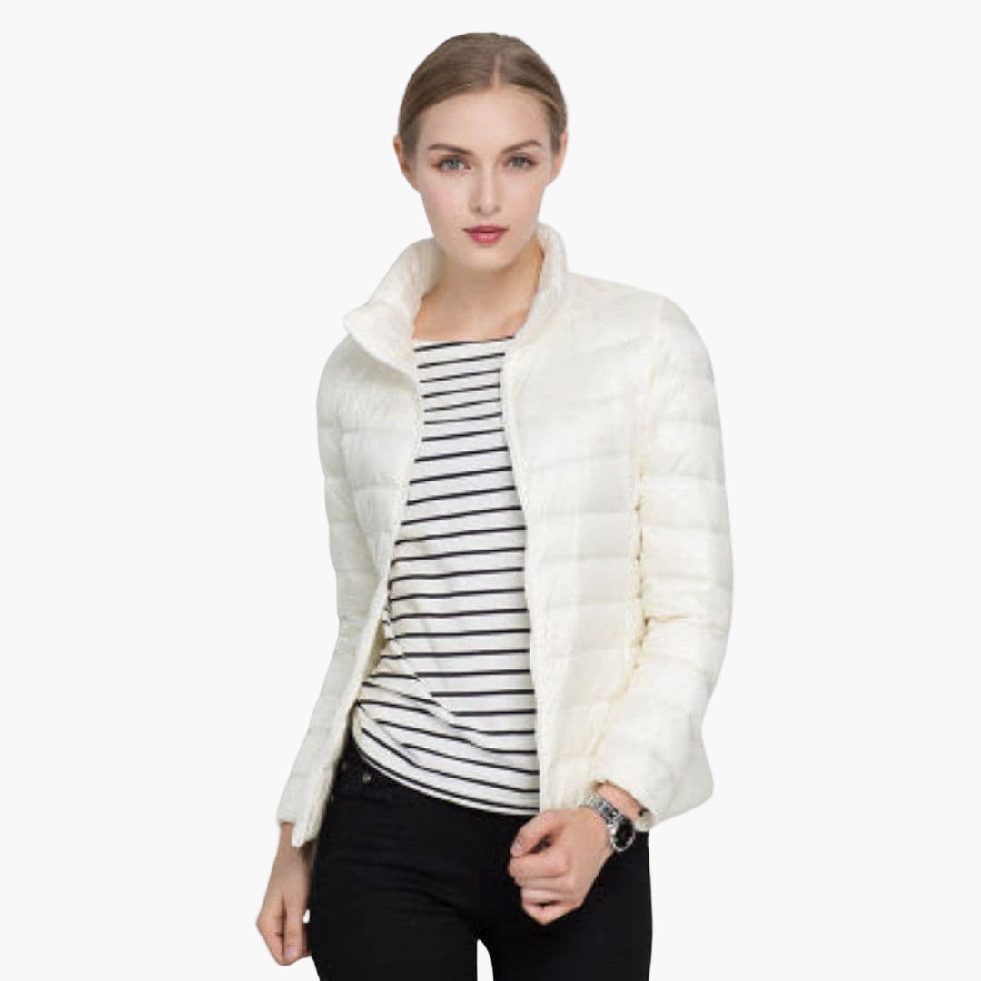 Women's quilted jacket stand-up collar front zip closure streamlined silhouette everyday warmth