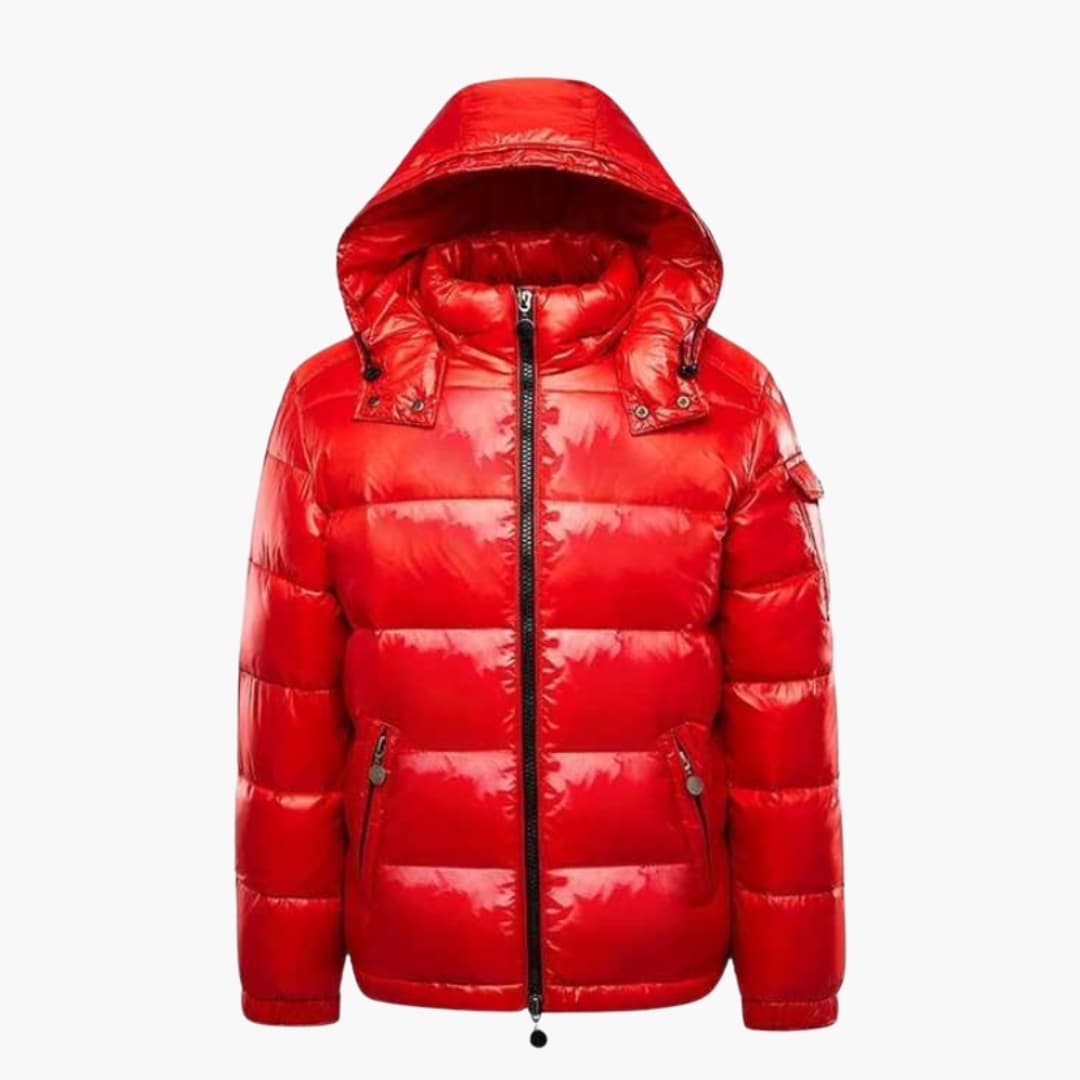 Men's black quilted jacket with hood, shiny finish, and zippered pockets for cold weather