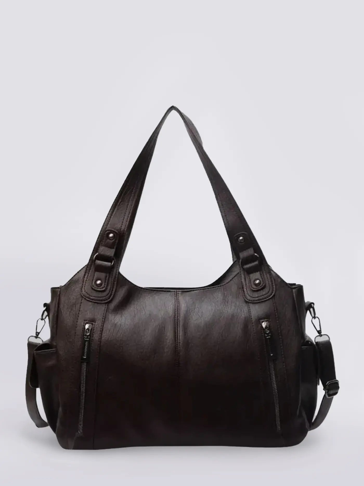 Soft leather shoulder bag with polished finish and multiple pockets, elegant professional style