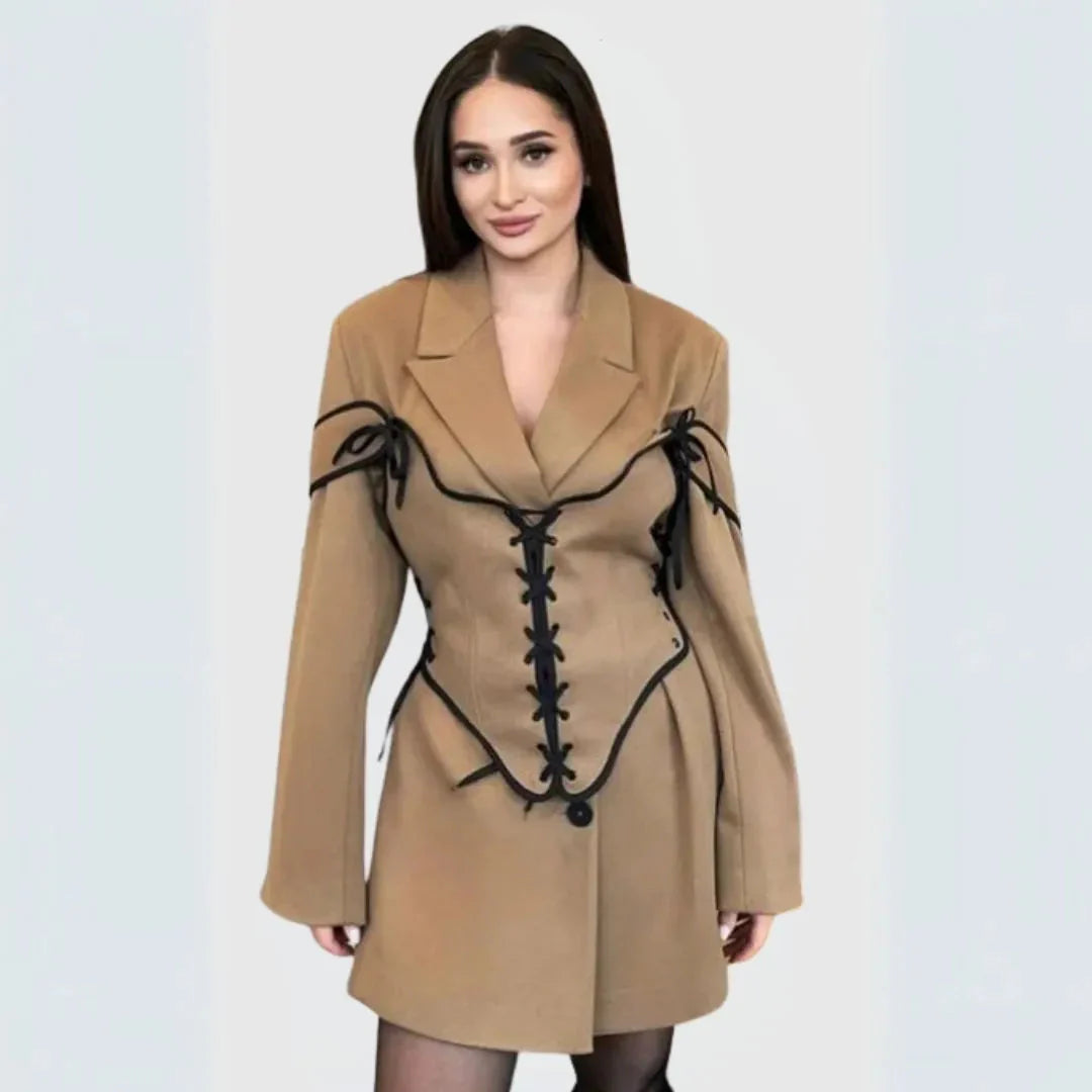 Black corset blazer dress with lace-up front, shoulder ties, and tailored suiting silhouette