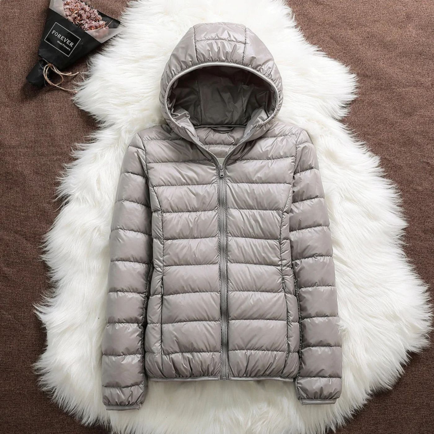 Lightweight quilted puffer hooded jacket packable insulated coat for outdoor cold weather adventures