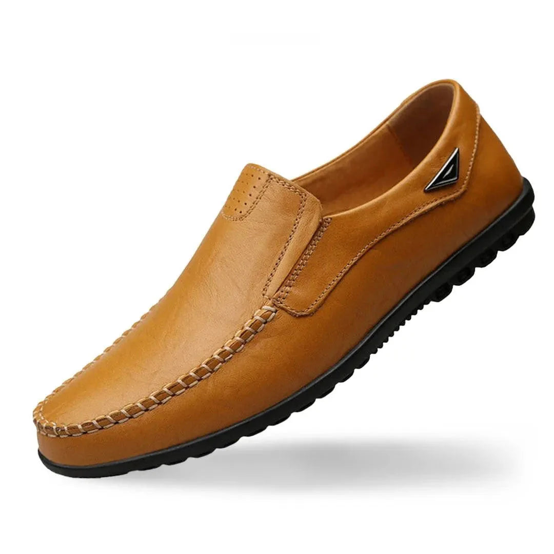 Vince men's slip-on loafers in neutral tone, sleek low-profile silhouette with elastic side gore