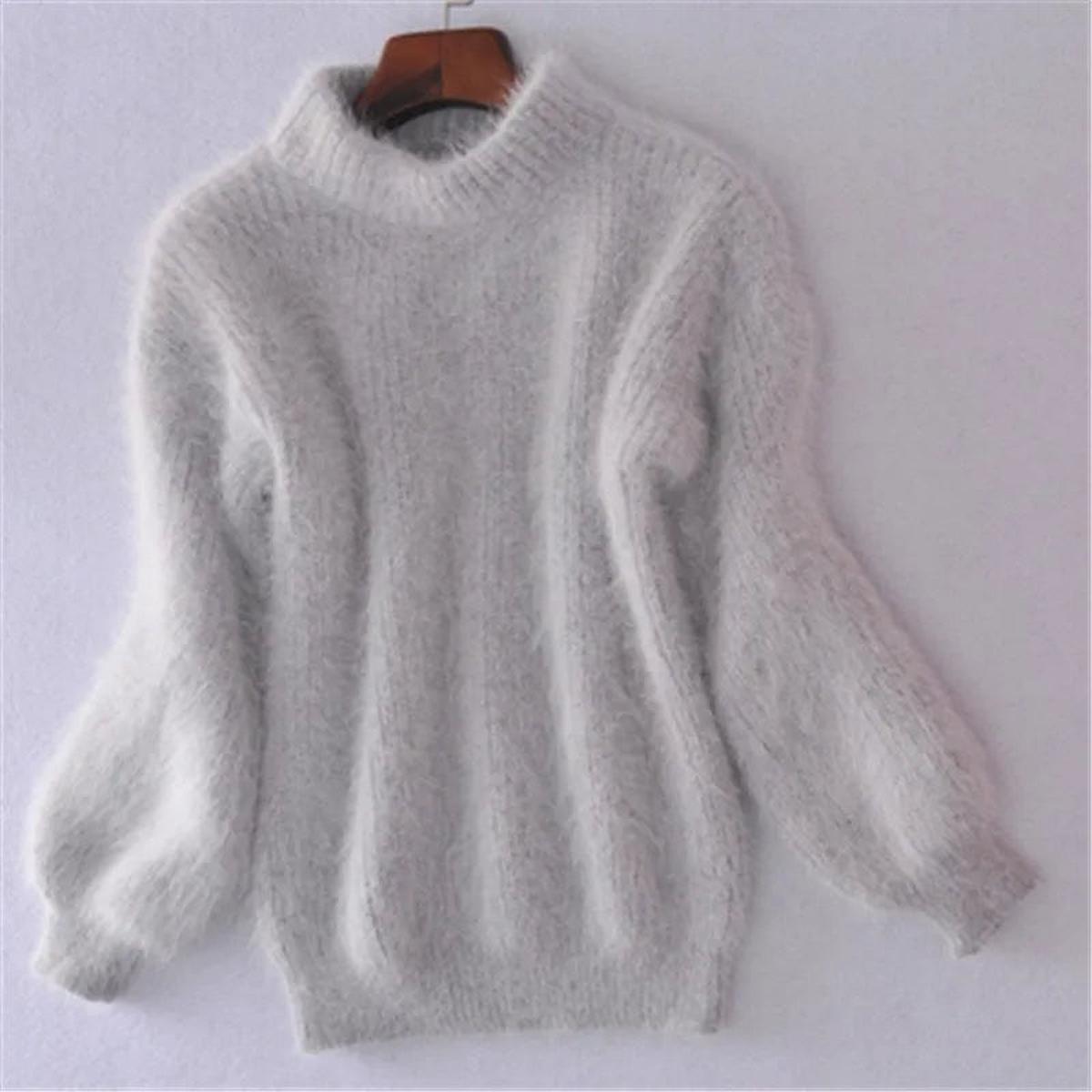 Women's cozy high-neck knit sweater in a relaxed silhouette, soft textured knit for effortless everyday style