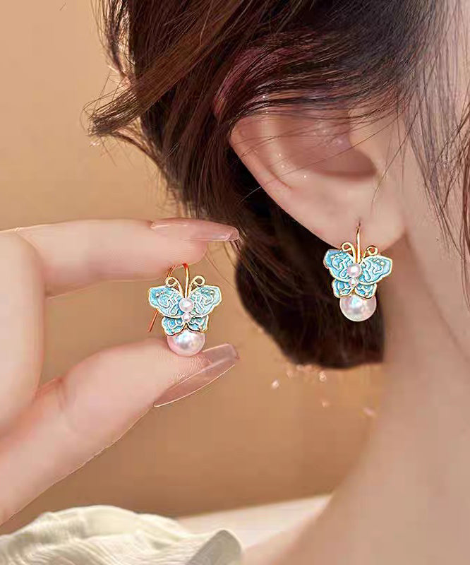 Boucles d'oreilles à tige vintage en alliage de cuivre bleu avec perles et papillon en émail - Urbann-Vibe