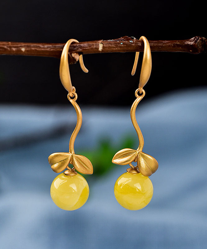 Boucles d'oreilles pendantes vintage en argent surmonté d'or et de cire d'abeille. - Urbann-Vibe