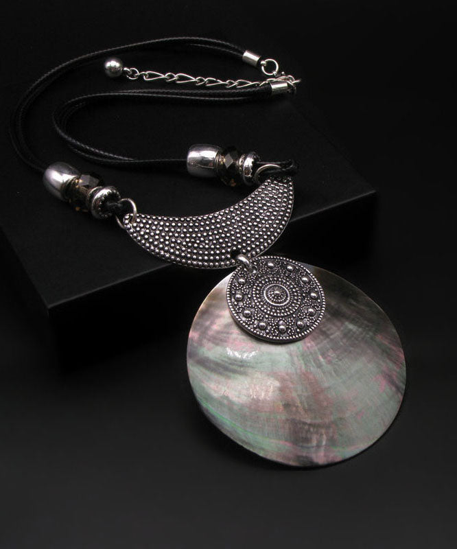 Collier pendentif coquillage vintage en argent sterling et soie - Urbann-Vibe