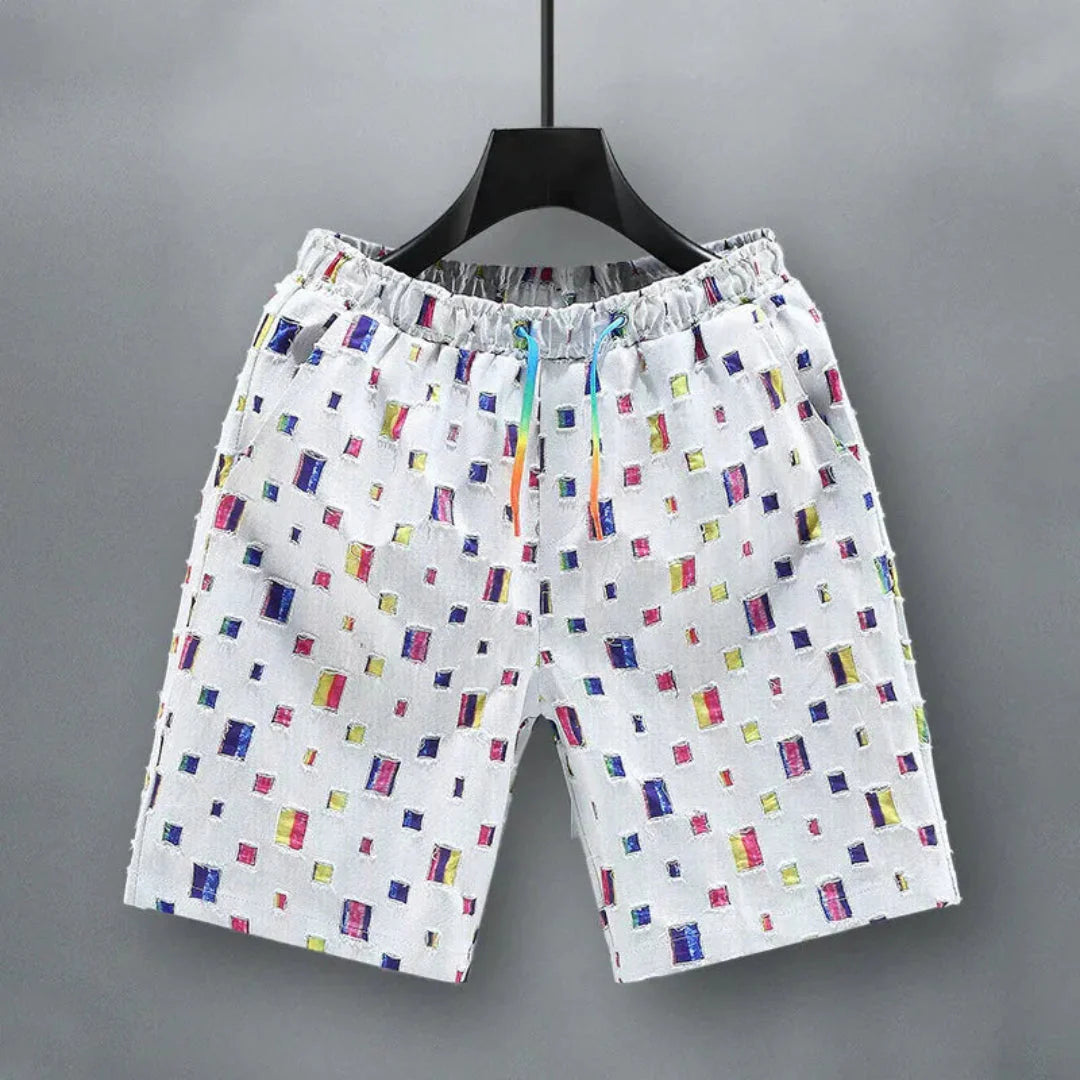 Men's relaxed-fit denim shorts with holographic reflective grid pattern and elastic drawstring waist