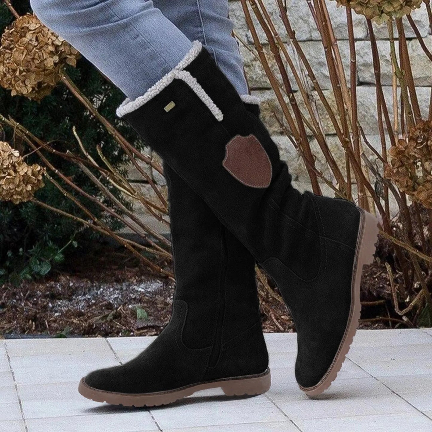 Women's mid-calf boots in suede-like fabric with faux fur lining, lug sole, and side zipper