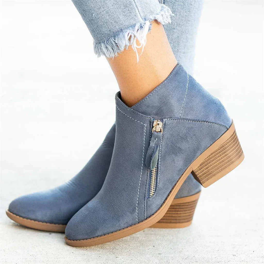 Women's Caroline zip heel boots in sleek silhouette with chic side zip closure for modern style