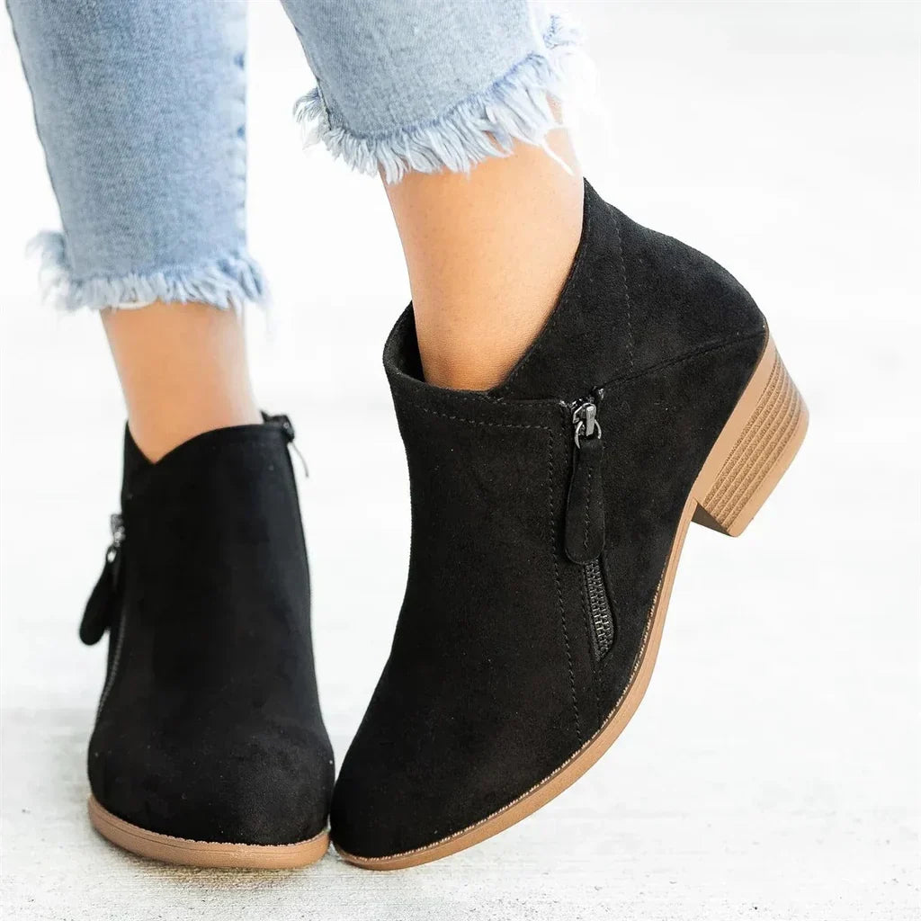 Women's Caroline zip heel boots sleek silhouette chic versatile style with smooth side zip closure