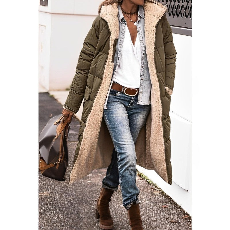 Women's long oversized padded coat with quilted design and soft shearling-like lining for cozy warmth