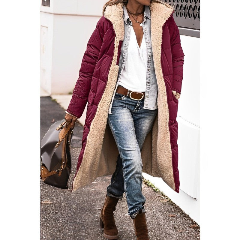 Long quilted puffer jacket with shearling hood lining, tailored silhouette for cold weather warmth
