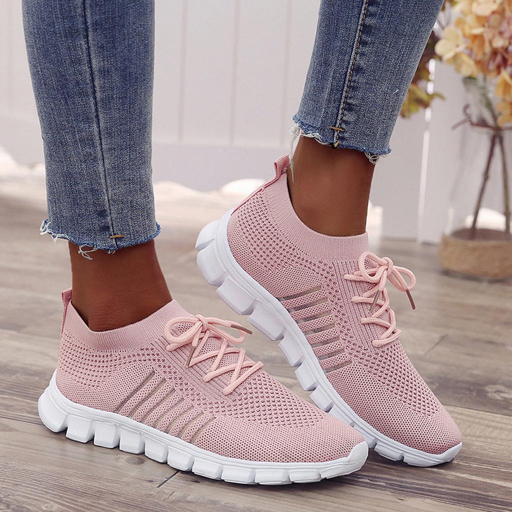 Women's breathable knit slip-on sneakers with decorative laces and cushioned shock-absorbing sole