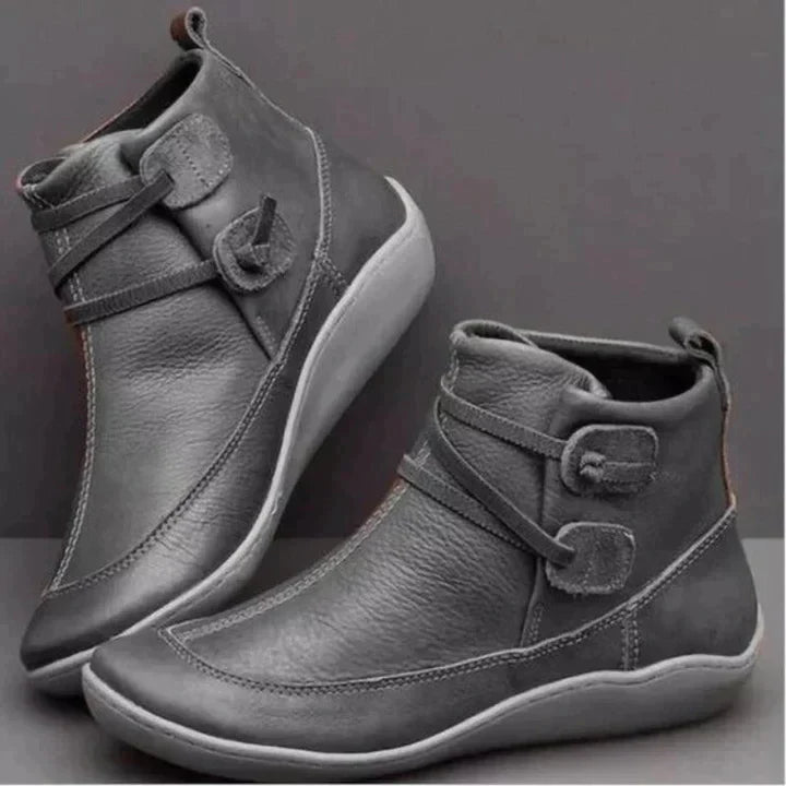 Women's brown leather mid-cut boots waterproof buckle detail supportive fit urban style