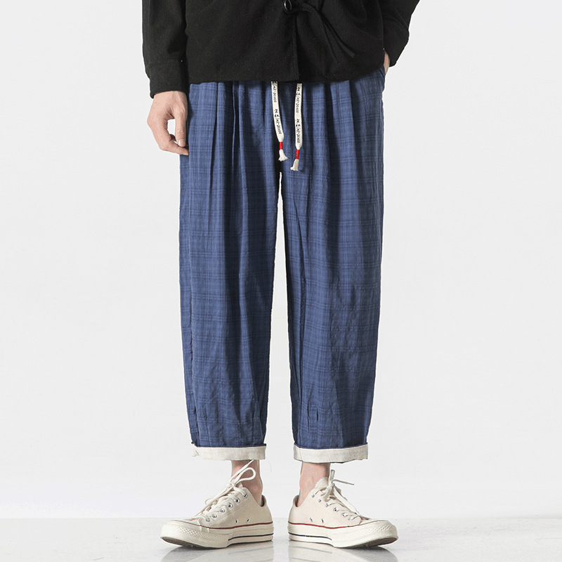 Beige micro-check unisex relaxed-fit pants with drawstring waist and rolled hems cotton blend