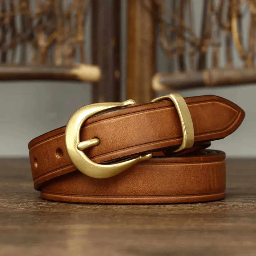 Wania slim unisex full-grain leather belt with distinctive curved brass buckle timeless everyday style
