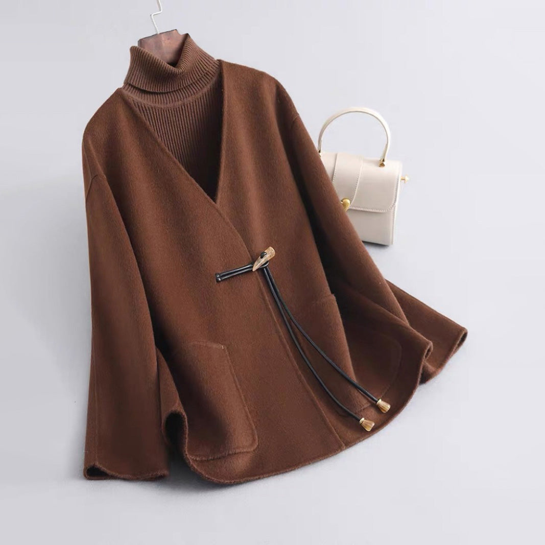 Women's structured wool-blend coat in neutral tone, minimalist silhouette with smooth itch-free finish