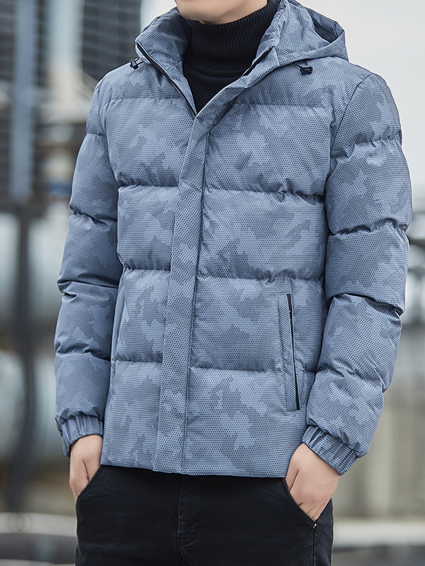 Black puffer jacket with stand-up collar, front zipper, minimalist style for everyday outdoor wear
