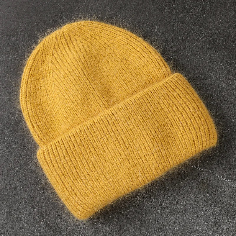 Women's cozy acrylic knitted winter hat with fashionable silhouette for superior cold weather comfort