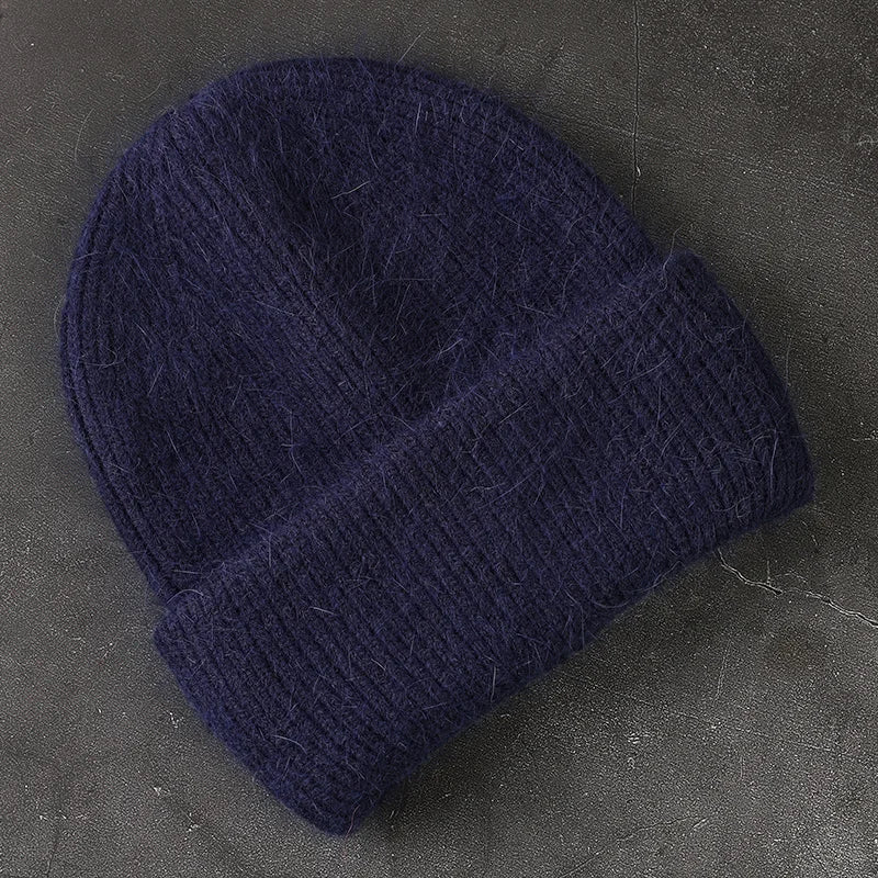 Women's cozy acrylic knitted winter hat with fashionable silhouette for cold weather comfort