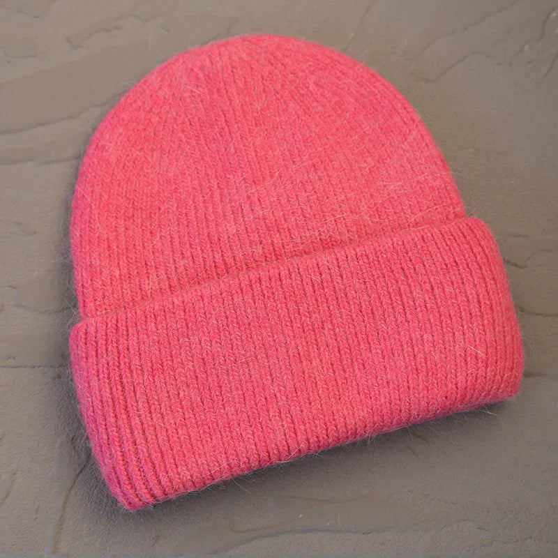 Women's cozy acrylic knitted winter hat with fashionable silhouette for cold weather comfort