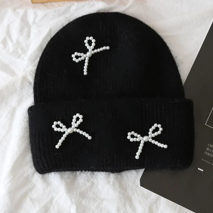 Women's cozy acrylic knitted winter hat with warm silhouette for cold weather comfort