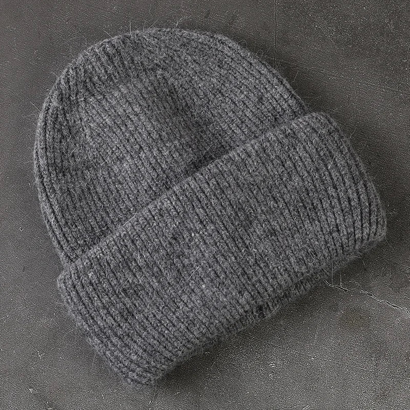 Women's cozy acrylic knitted winter hat with fashionable silhouette for cold weather comfort