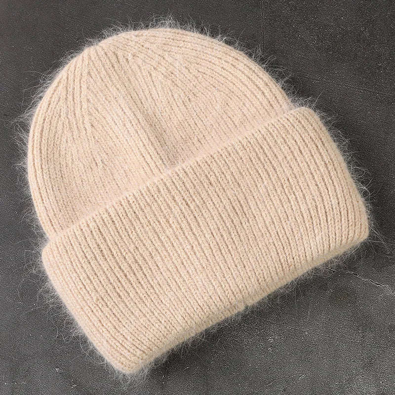 Women's cozy acrylic knitted winter hat with fashionable urban silhouette for cold weather comfort