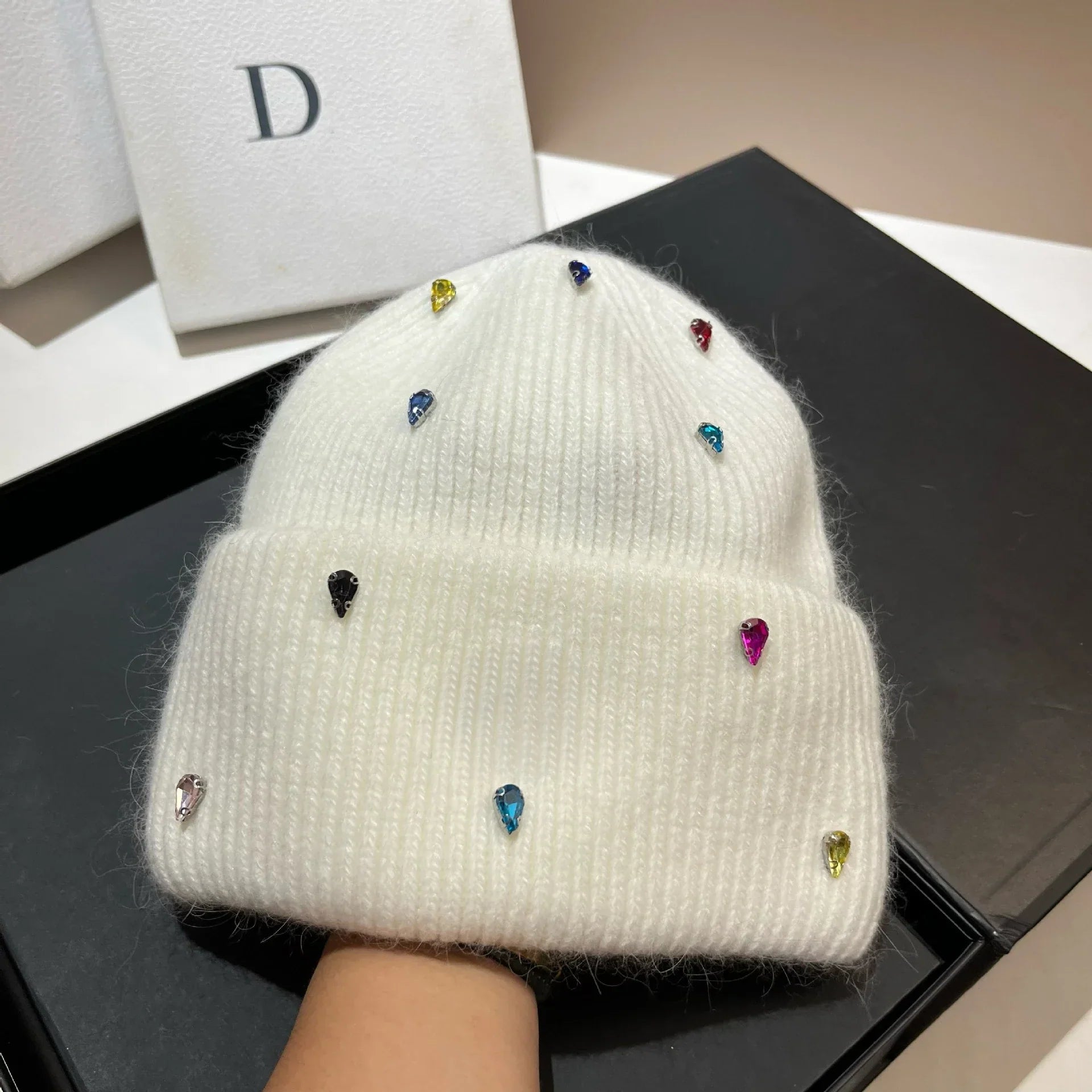 Women's cozy acrylic knitted winter hat with fashionable silhouette for superior cold weather warmth