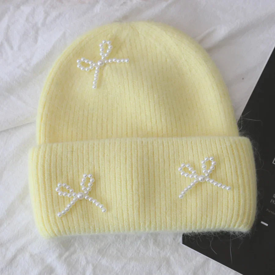Women's cozy acrylic knitted winter hat with fashionable urban silhouette for superior cold weather warmth