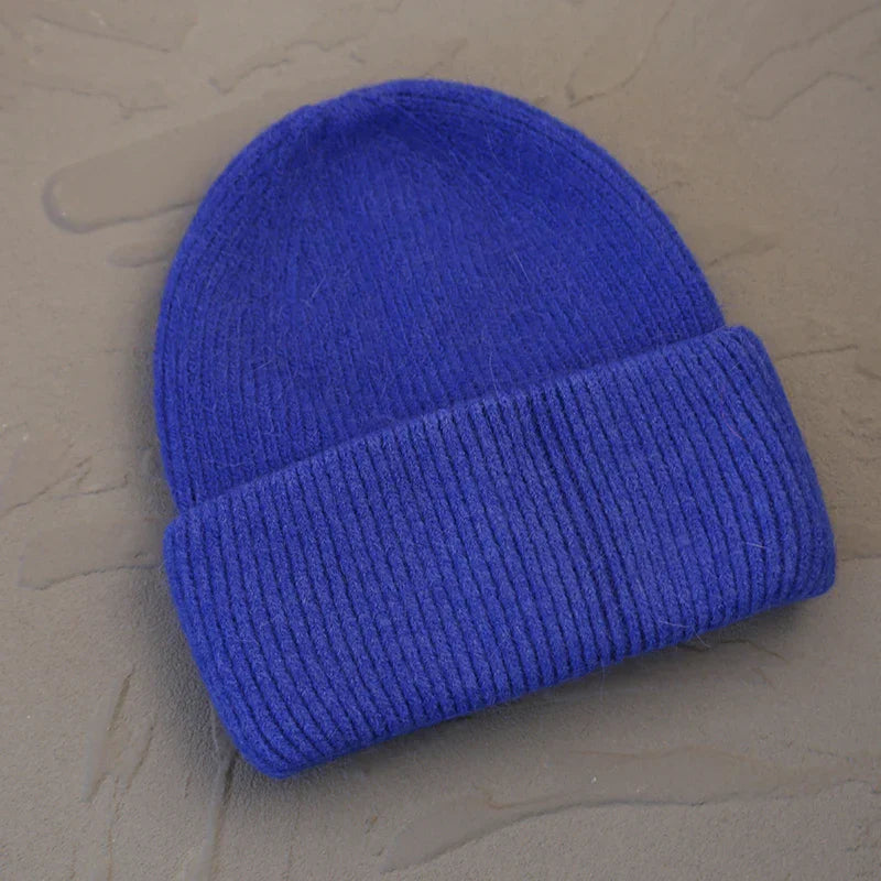 Women's cozy acrylic knitted winter hat in neutral tone with warm ribbed silhouette for cold weather