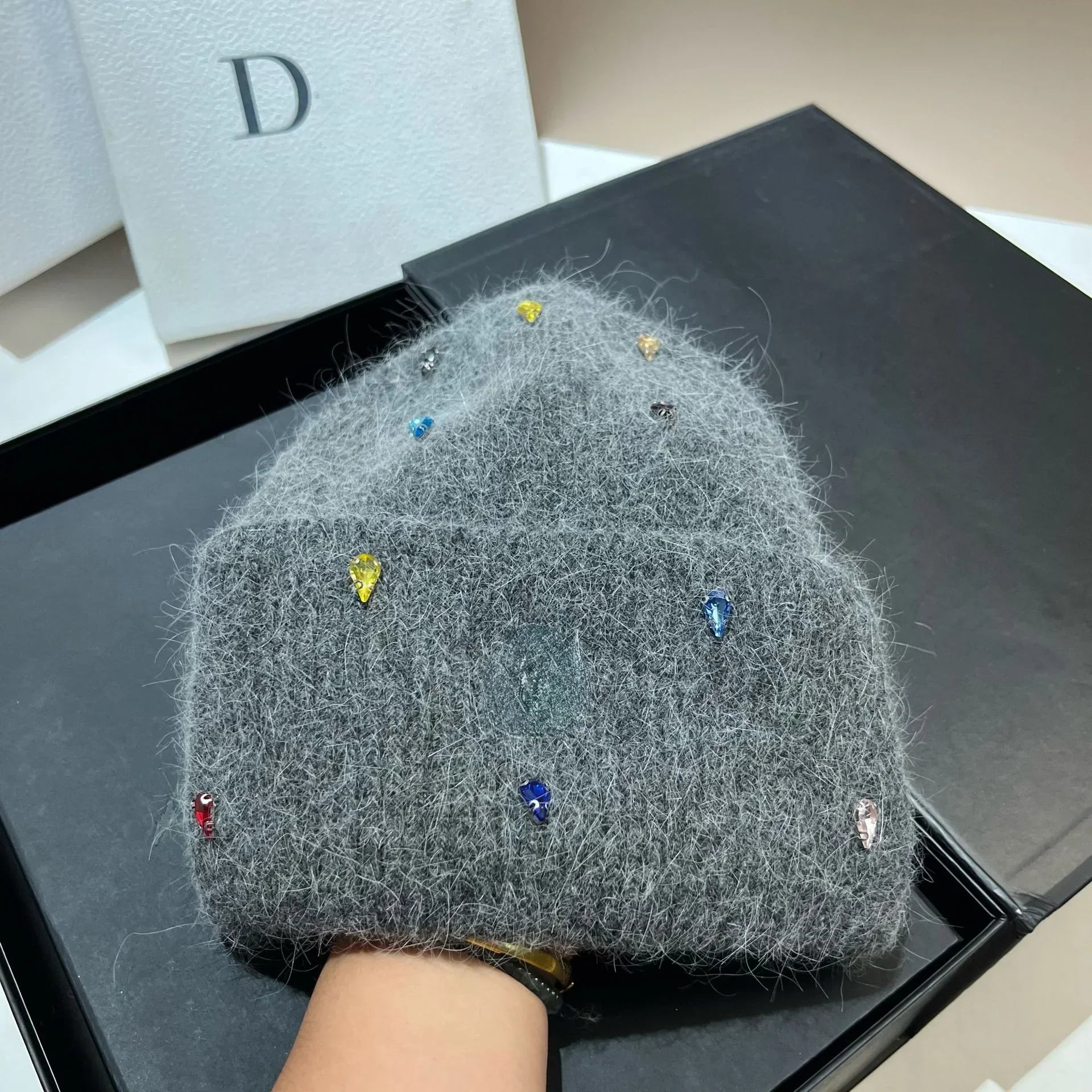 Women's cozy acrylic knitted winter hat with fashionable urban silhouette for superior cold weather comfort