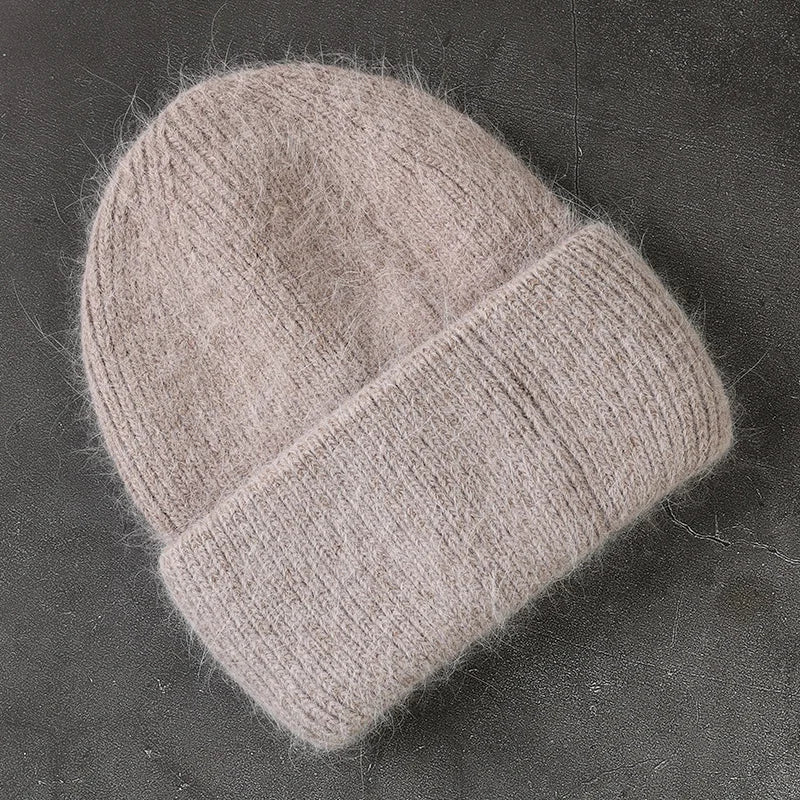 Women's cozy acrylic knitted winter hat with fashionable urban silhouette for cold weather comfort