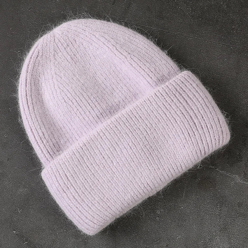 Women's cozy acrylic knitted winter hat with fashionable urban silhouette for superior cold weather warmth