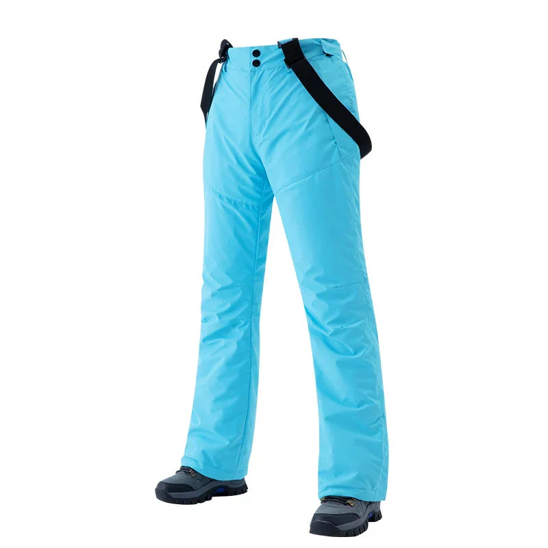Women's black insulated ski pants windproof waterproof slim-fit design for winter sports comfort
