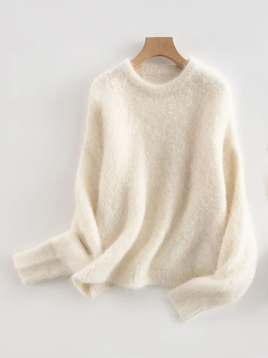 Women's loose fit alpaca wool sweater with dropped sleeves, cozy oversized silhouette for winter