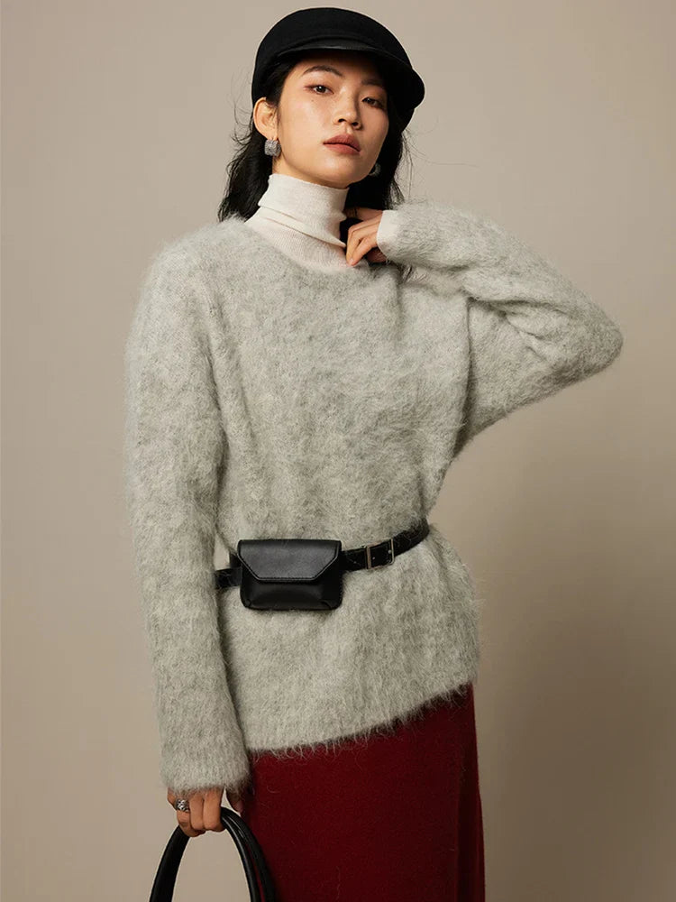 Women's loose fit alpaca wool sweater with dropped sleeves, cozy oversized silhouette for winter