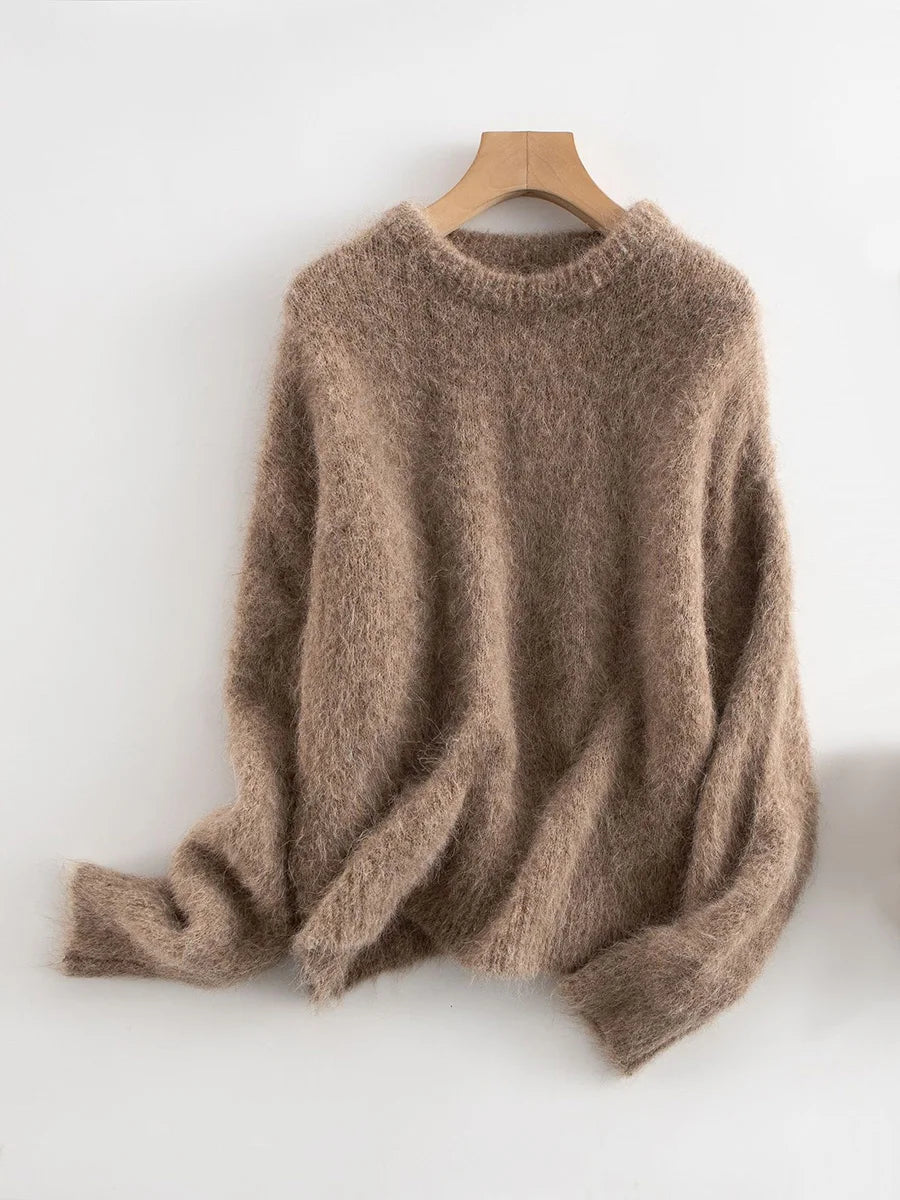 Women's loose-fit alpaca wool sweater with dropped sleeves, cozy oversized silhouette for winter