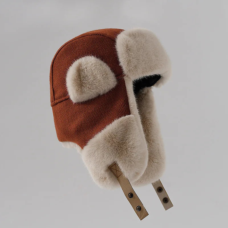 Women's blue faux fur plush winter hat with cozy warm design for cycling and skiing outdoors