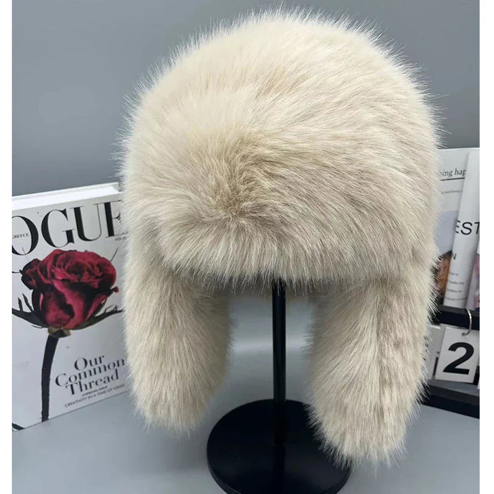 Women's blue faux fur plush winter hat with cozy Nerk lining, perfect for cycling and skiing
