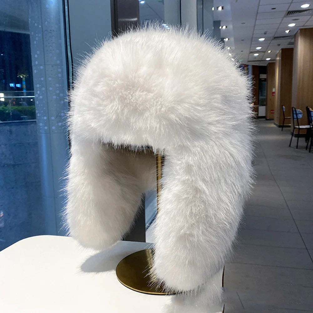 Women's blue faux fur plush winter hat with cozy Nerk lining for cycling and skiing outdoors