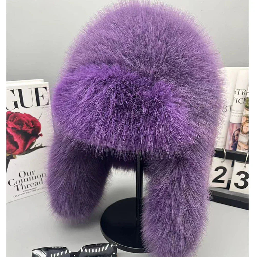 Women's blue faux fur plush winter hat with warm cozy design for cycling and skiing outdoors