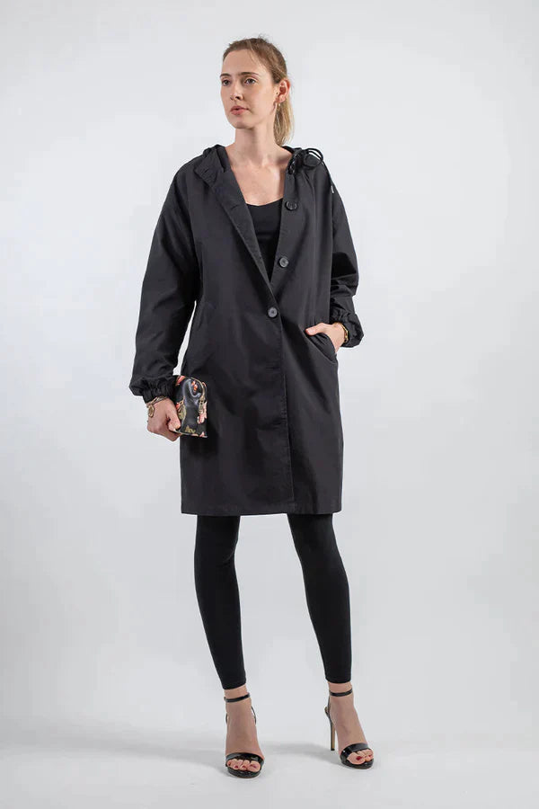 Women's waterproof hooded jacket sleek modern silhouette with moisture-resistant all-weather protection
