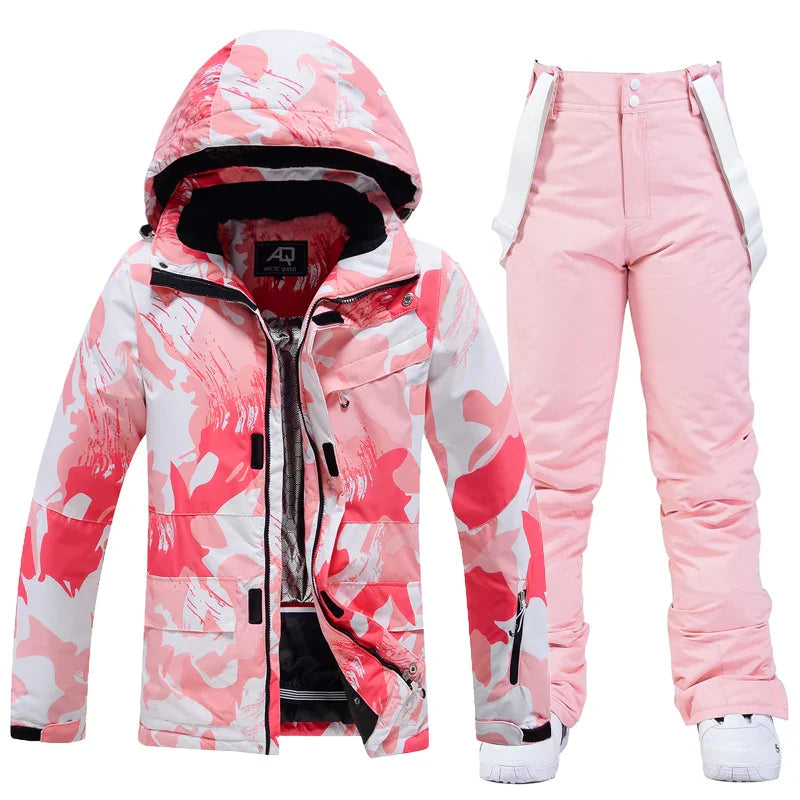 Women's waterproof ski suit set in bold colorblock, slim-fit design with moisture-wicking protection