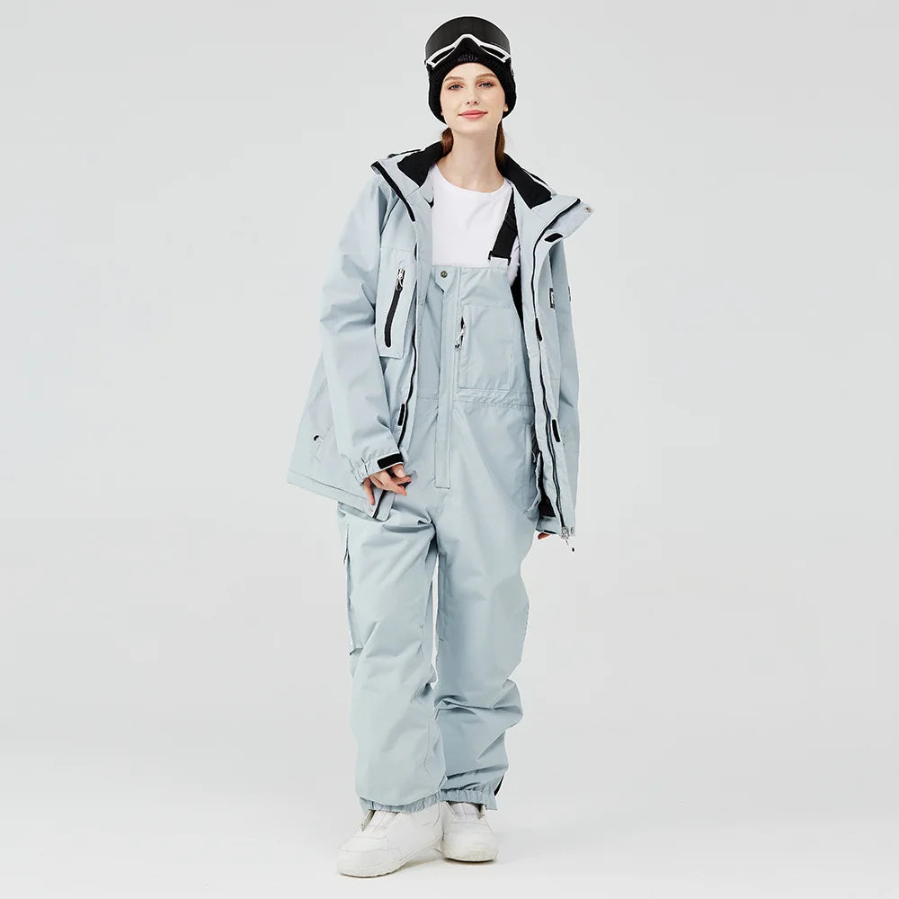 Women's waterproof ski suit with bib pants and suspenders, breathable lightweight design for skiing
