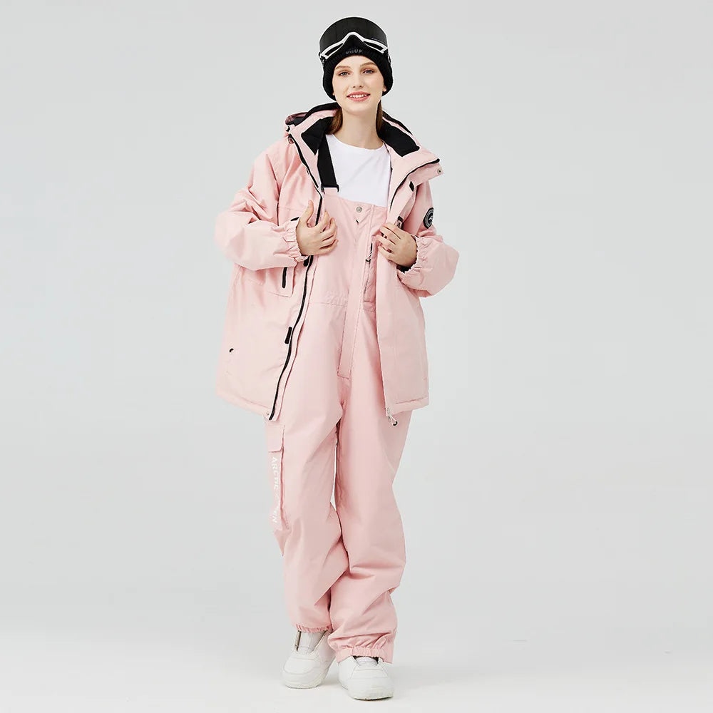 Women's waterproof ski suit with bib pants and suspenders, breathable design for skiing and snowboarding