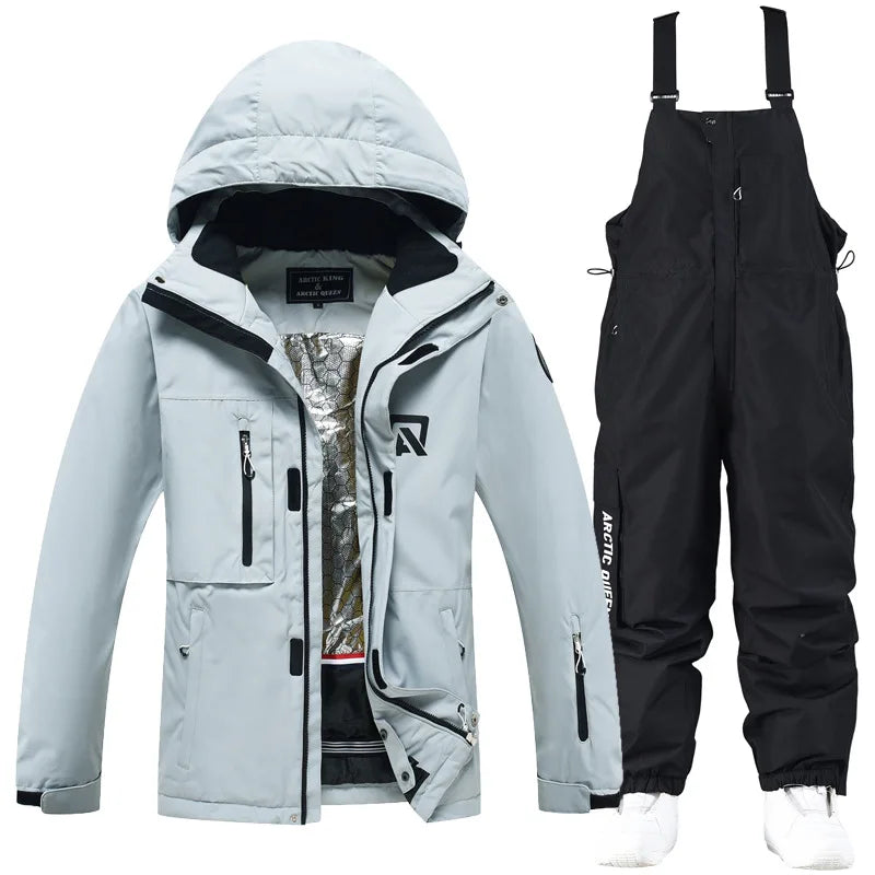 Women's waterproof ski suit with bib pants and suspenders, breathable lightweight design for skiing