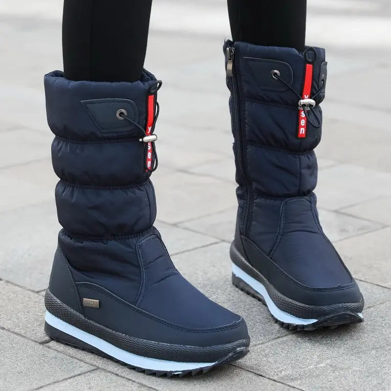 Women's waterproof mid-calf winter boots with cozy velvet lining, non-slip sole for cold weather
