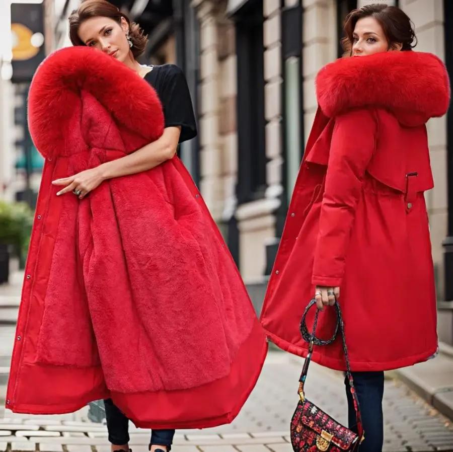Women's waterproof winter parka with oversized lined hood, warm chic style for cold weather