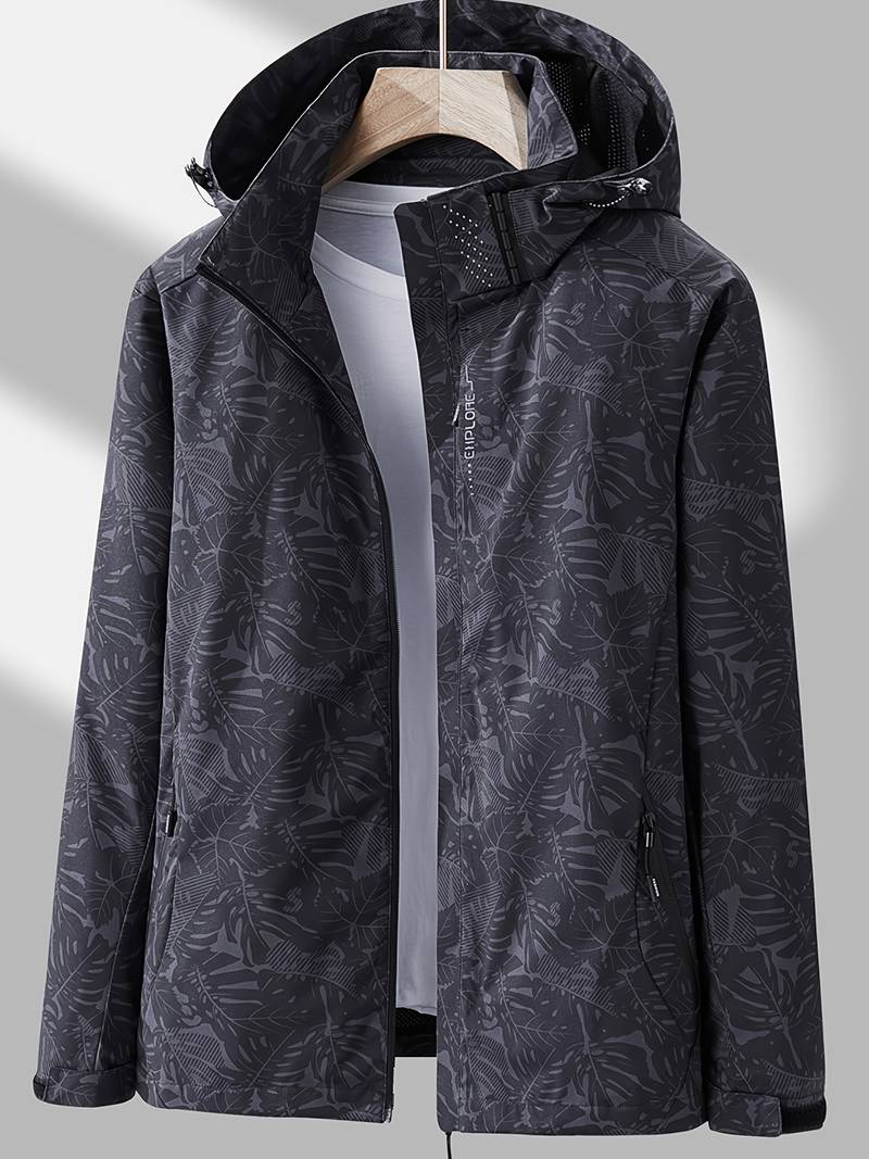 Women's lightweight windproof waterproof jacket with adjustable hood and tonal leaf print for active wear
